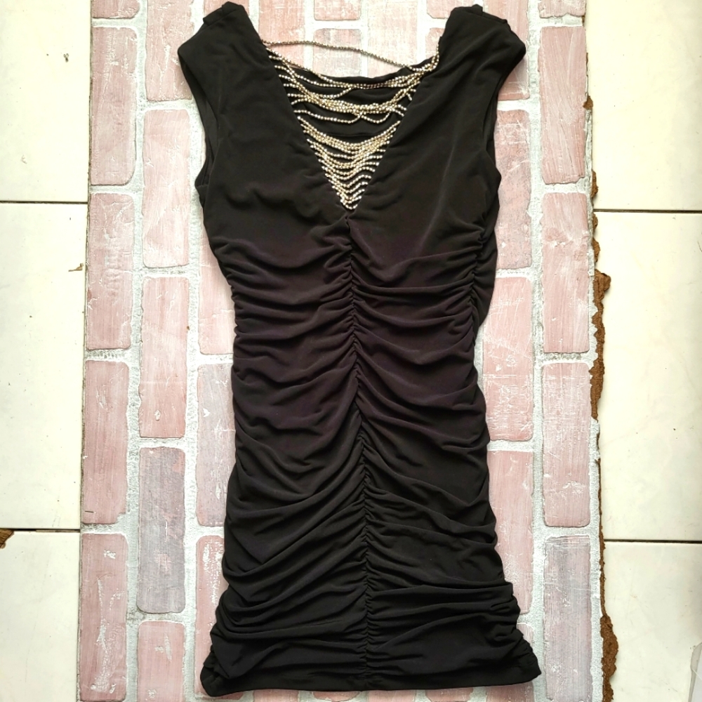 Black cocktail dress with silver hanging beads on back